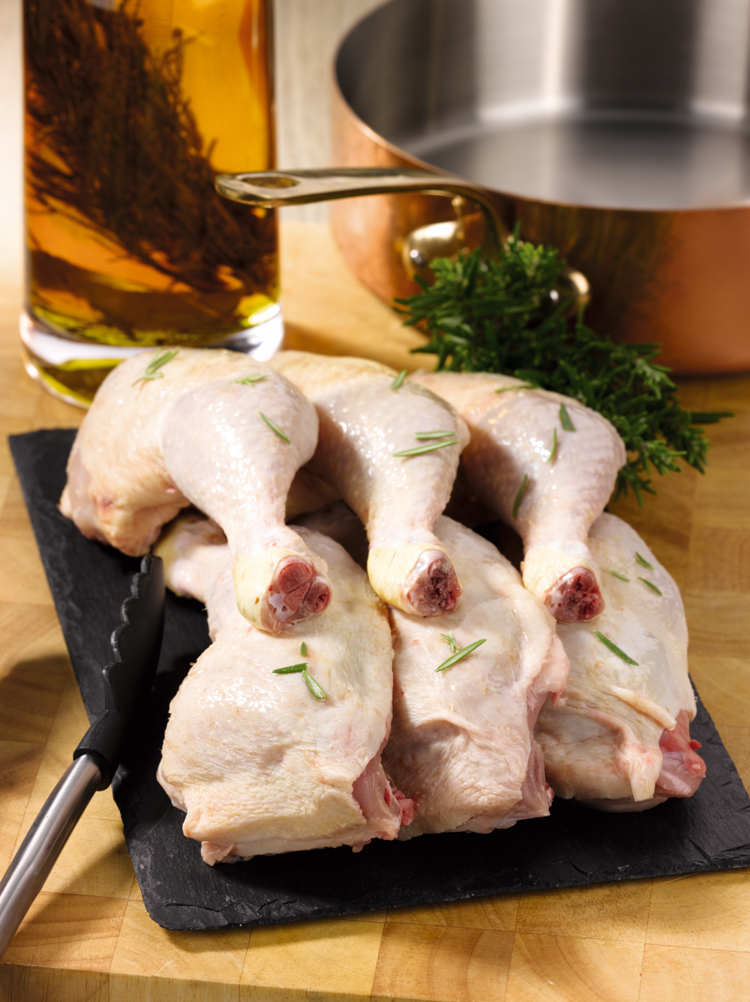 Cuisses de poulet avec partie de dos